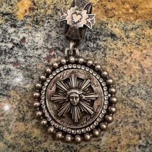 French Kande Silver Sunburst Pendant